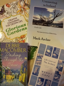 Three books and a colouring book